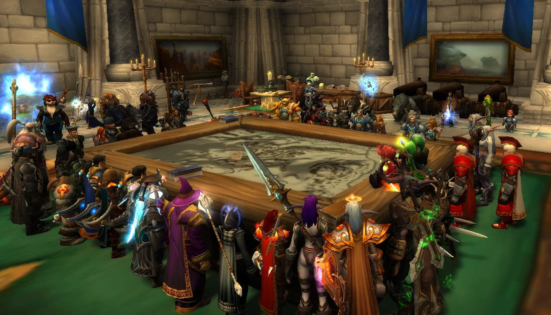 A group of players around a table socializing